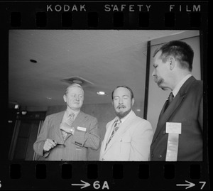 Richard Battin, Edgar Mitchell, and Reinald Neilsen at IEEE's International Computer Society Conference