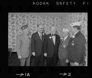 Maurice Donahue and City Councilor Albert "Dapper" O'Neil with VFW and American Legion members at testimonial dinner for O'Neil at Statler Hilton