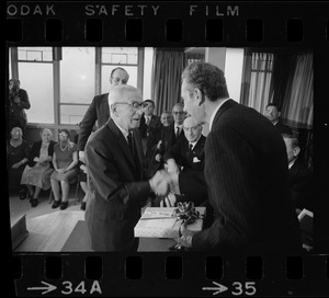 Italian Foreign Minister Aldo Moro receives gift from Salvadore Barrile at Don Orione Home in East Boston