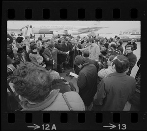 Italian Prime Minister Emilio Colombo addressing press at Logan Airport