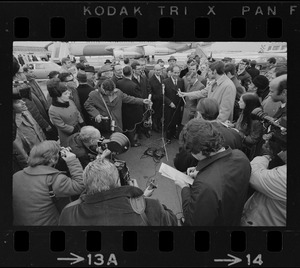 Italian Prime Minister Emilio Colombo addressing press at Logan Airport