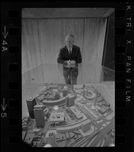 Mayor John Collins looking at model of Boston at City Hall
