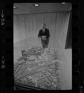 Mayor John Collins looking at model of Boston at City Hall