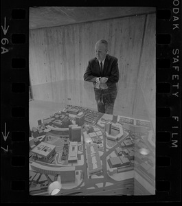 Mayor John Collins looking at model of Boston at City Hall