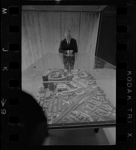 Mayor John Collins looking at model of Boston at City Hall