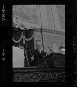 Unidentified man holding gavel in Massachusetts House chamber