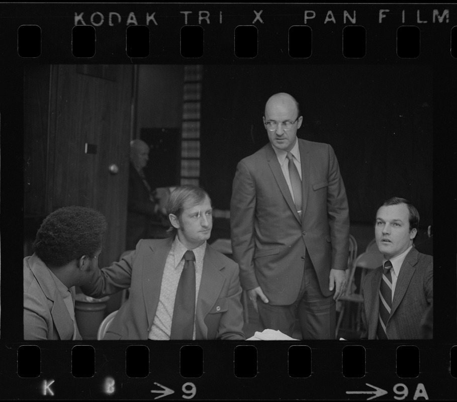 Unidentified men at the Massachusetts State House