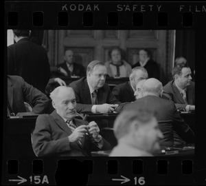 Representative Sidney Curtiss, center, in Massachusetts House chamber