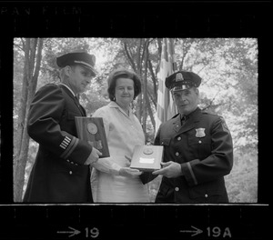 Congresswoman Louise Day Hicks is flanked by Boston Police Capt. Charles Barry, left, and officer John Corbett during Flag Day exercises held yesterday at Parkman Bandstand