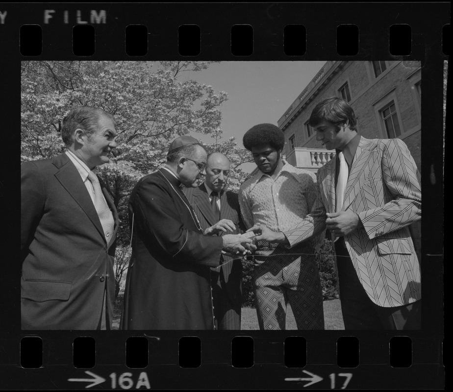 A block of tickets for the Schaefer Sound of Summer Concert with Arthur Fiedler and members of the Boston Pops Orchestra is presented to an appreciative Archbishop Medeiros. On hand for the presentation were, from left, sportscaster Ken Coleman, the Archbishop, Bill Koster, executive director of the Jimmy Fund, and the Red Sox stars Carl Yastrzemski and Reggie Smith