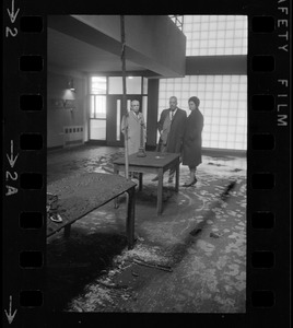 Unidentified man, William Ohrenberger, and Louise Day Hicks at site of school fire