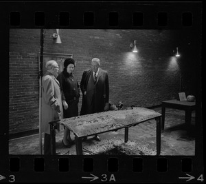 Unidentified man, William Ohrenberger, and Louise Day Hicks at site of school fire