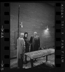 Unidentified man, William Ohrenberger, and Louise Day Hicks at site of school fire