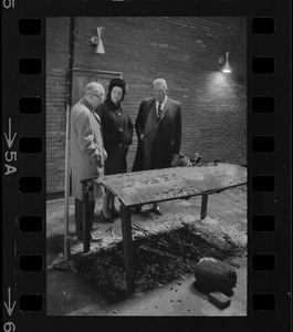 Unidentified man, William Ohrenberger, and Louise Day Hicks at site of school fire