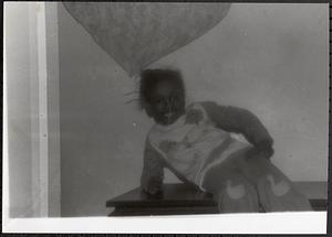 Girl sitting on a table
