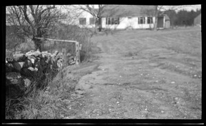 Unidentified yard and house