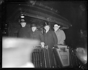 Gov. Curley shown with Mayor Fred W. Mansfield and Commissioner Eugene M. McSweeney on Roosevelt's special train in Boston