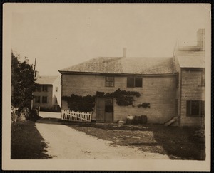 Cushman's Store, 196 Main Street, rear view, with 5 Summer Street in the background