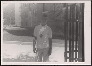 Young man standing in Newtowne Court