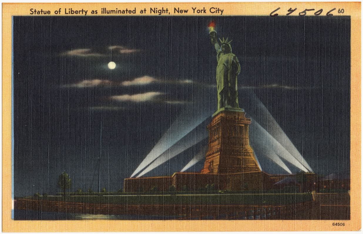 Statue of Liberty as illuminated at night, New York City