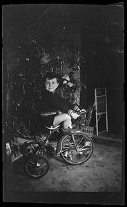 Child on tricycle