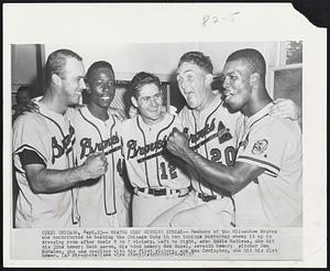 Braves Keep Winning Streak--Members of the Milwaukee Braves who contributed to beating the Chicago Cubs in 10 innings yesterdays whoop it up in dressing room after their 9 to 7 victory. Left to right, are: Eddie Mathews, who hit his 32nd homer; Hank Aaron, his 42nd homer; Bob Hazel, seventh homer; pitcher Don McMahon, who was credited with his first victory, and Wes Covington, who hit his 21st homer.