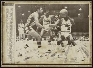 Confrontation--Cleveland's Joe Cooke (with ball) runs into some sizeable opposition from Atlanta's Bill Bridges as he tries to bring the ball down the floor in the second quarter of tonight's Hawks-Cavaliers game. Also getting into the action are Luther Rackley of Cleveland (45) and Walt Hazard of Atlanta (42).