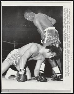 Light heavyweight champion Bob Foster knocks Frank DePaula to the canvas during first round of their bout at Madison Square Garden here 1/22. Foster knocked down DePaula three times in the first for a TKO victory.
