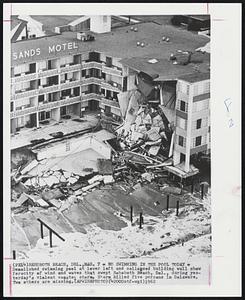 No Swimming in the Pool Today - Demolished swimming pool at lower left and collapsed building wall show ferocity of winds and waves that swept Rehoboth Beach, Del., during yesterday's violent coastal storm. Storm killed five persons in Delaware. Two others are missing.