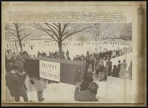 Cambridge, Mass. – Harvard Students Protest War – Harvard University students as they demonstrated today against American involvement in Vietnam. Students in foreground with “casket” are on steps of Harvard Law School. Rally called by Students for a Democratic Society was timed to take place while United Nations Ambassador Arthur Goldberg was visiting Law School. He did not take any notice of demonstration.