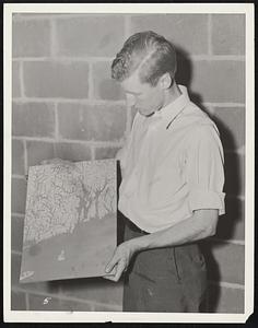 What a finished Section Looks Like - Richard Logan holds the block containing the state of Rhode Island and Narragansett Bay. The little island is Block Island. To the left may be seen the Eastern tip of Long Island.