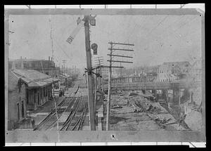 Railroad being lowered, looking west at Main St. and Walnut St. bridges