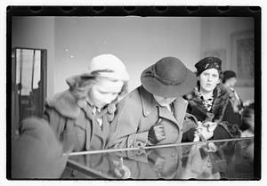 People including Maude Sanromá looking at exhibits, Museum of Fine Arts