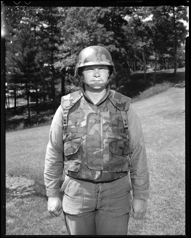 CEMEL- body armor, vest (kevlar) & helmet (front view) & cradle