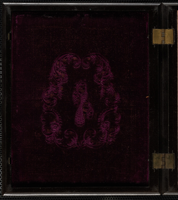 Portrait of woman in dark bonnet