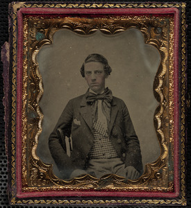 Portrait of man in checkered waist coat