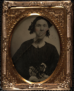 Portrait of woman in black lace gloves
