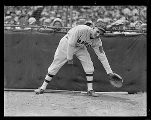 Boston Braves first baseman Buck Jordan poses with his mitt at Braves Field