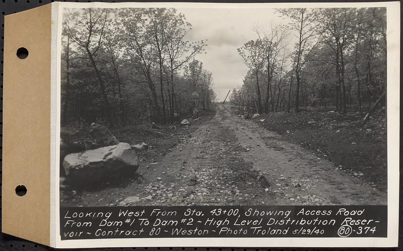 Contract No. 80, High Level Distribution Reservoir, Weston, looking west from Sta. 43+00, showing Access Road from dam 1 to dam 2, high level distribution reservoir, Weston, Mass., May 29, 1940