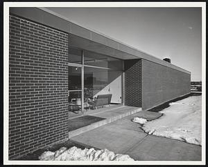 Front view shows the lobby entrance to Dow's modern, new building for biochemical research.