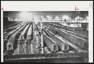 Empty commuter trains and locomotives jam Pennsylvania Railroad yards at Philadelphia after Transport Workers Union strike shut down the road. Strike is first in Pennsy's 114-year history to halt all operations.