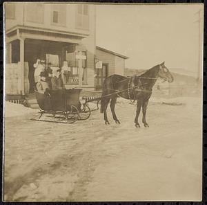 Whately House behind a horse and sleigh