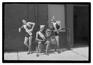 Three men posing wearing sashes, Boston Park Department Circus entertainers