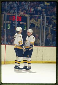 Boston: (circa 1986-87) # 7 Ray Bourque skates with teammate #11, Steve Kasper Boston Garden