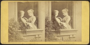 Two women with a letter