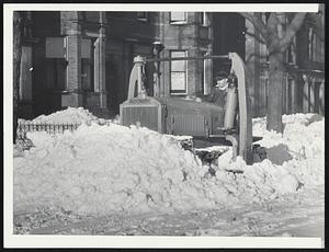 Snow Tractor--It took the full horse power of this "Bulldozer" type tractor to plow to sweep away the drifts on Marlboro street.
