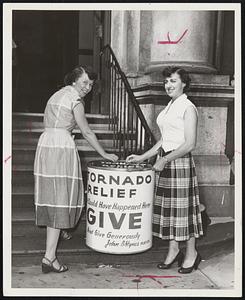 Good Neighbor Barrels - They're waiting for your coins in Mayor Hynes' drive to aid Worcester tornado sufferers. Here, Mary J. Coughlin of Jamaica Plain (left) and Jeanne Cogliano of Roxbury, make their contributions.