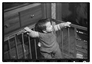 Toddler in crib