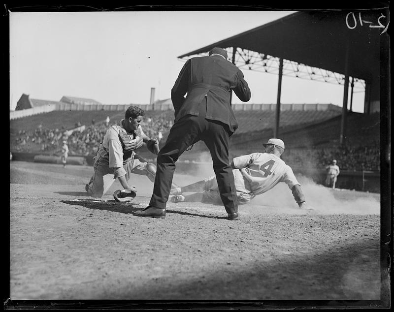 Chick Hafey of the Cincinnati Reds out at home against the Boston Braves