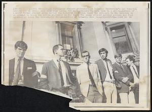 New York – Library Patrol – As student protesters at Columbia University’s Low Memorial Library sit on window sill with sign asking for more students to join them in a sit-in, members of a newly-formed student group called the Majority Coalition block the entrance to the building in an attempt to break the sit-in yesterday in New York. The group allowed neither persons nor food to enter or leave the library.